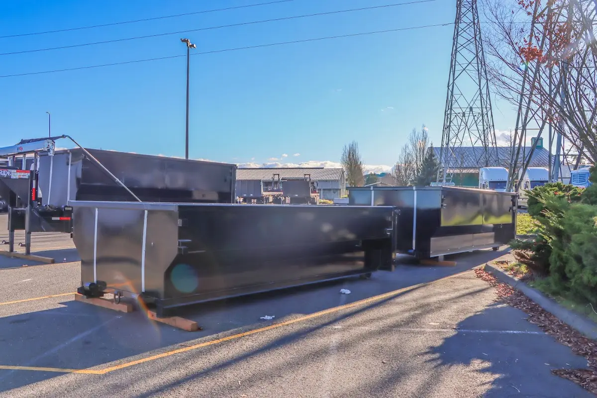 Roll-off dumpster ready for waste disposal at job site for Yard Waste Dumpster Rental in Woolwich